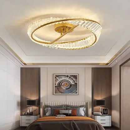 Modern gold decorbites crystal led chandelier with gold-toned circular design and crystal accents for living room lighting