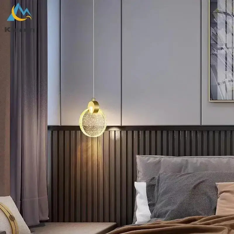 Modern gold decorbites crystal led pendant light with spherical clear glass globe and sparkling particles for living room