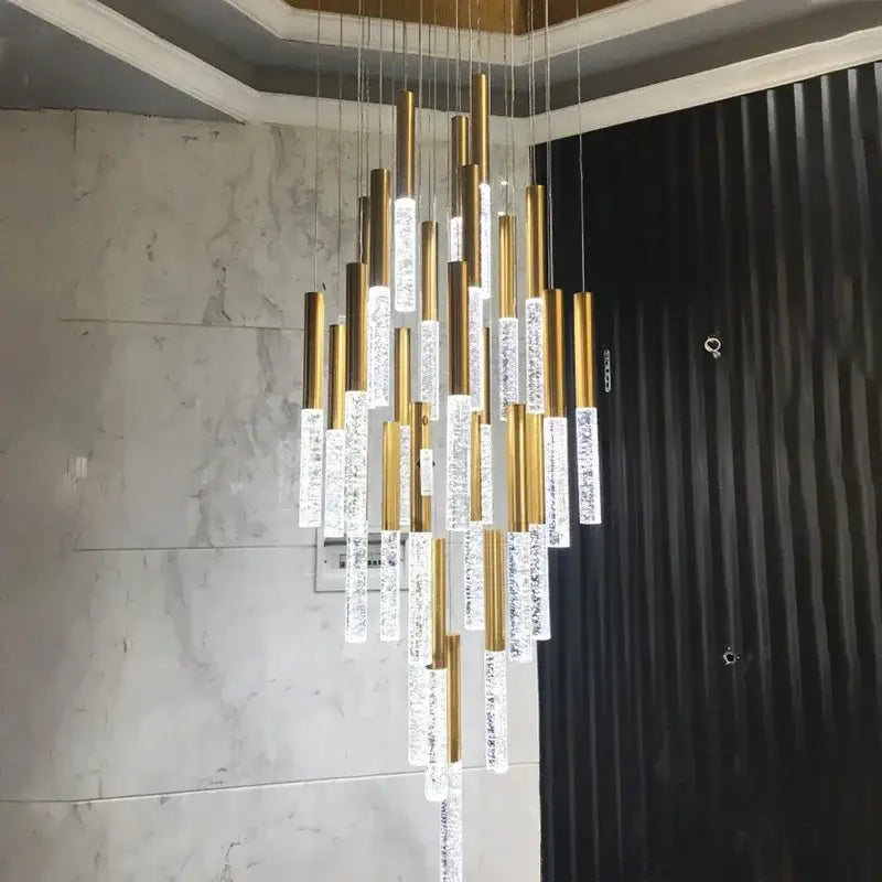 Modern gold decorbites crystal staircase chandelier with cascading clear crystals for elegant living room lighting