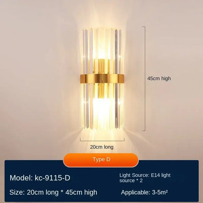 Modern gold decorbites crystal wall lamp with vertical crystal rods and brass band emitting warm light for luxury décor