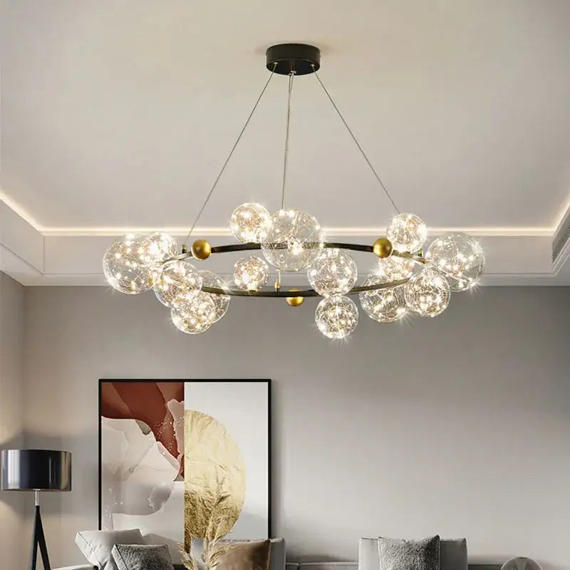 Modern gold decorbites glass ball chandelier with clear glass spheres and black frame for dining room lighting