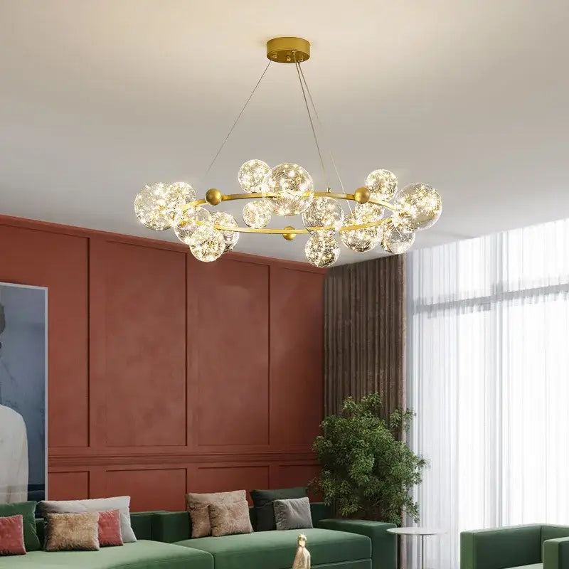 Modern gold decorbites glass ball chandelier with multiple clear bubble-like spheres for dining room lighting