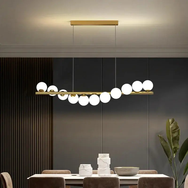 Modern gold decorbites glass ball g9 led chandelier with sleek horizontal bar and white spherical bulbs for dining room lighting