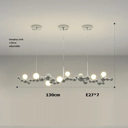 Modern chrome-finished decorbites designer molecule chandelier with spherical bulbs in an organic branching design for dining room decor