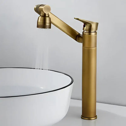 Modern gold brass-finished bathroom sink faucet with articulated spout and detachable spray for kitchen or bathroom sink