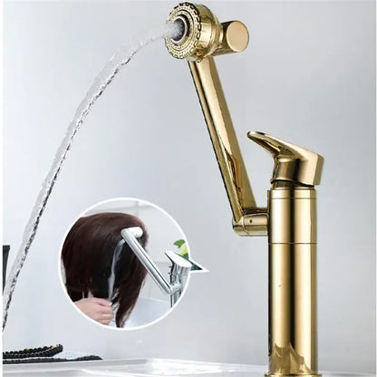 Modern gold detachable spray sink faucet with sleek design for bathroom sink faucet and kitchen use spraying water in arc