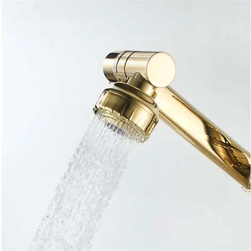 Modern gold detachable spray bathroom sink faucet with textured grip and multiple nozzles for bathroom sink use