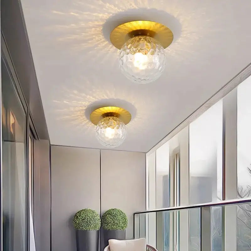 Modern gold diamond crystal ceiling lights with a gold finish and textured clear glass globe for bedroom or living room
