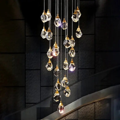 A modern gold diamond crystal chandelier with faceted clear glass droplets for living room staircase lighting