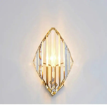 Modern gold diamond crystal wall lamp with clear faceted panels and gold-toned metal frame for luxury decorbites crystal wall decor