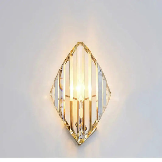 Modern gold diamond crystal wall lamp with clear faceted panels and gold-toned metal frame for luxury decorbites crystal wall decor