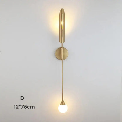 Modern gold-toned decorbites double-head wall lights with sleek cylindrical top and spherical glass bulb for living room decor