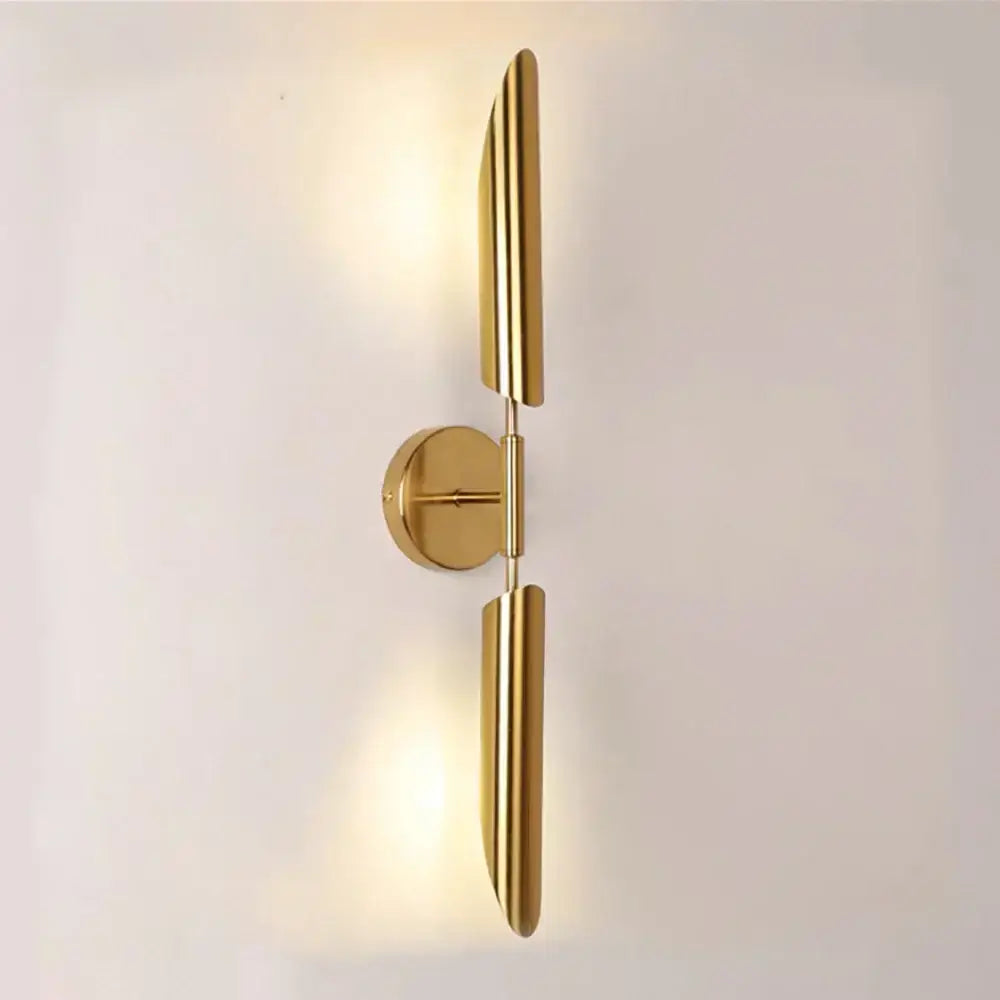Modern gold double-head wall lights with sleek symmetrical arms and circular base for living room decorbites wall lights