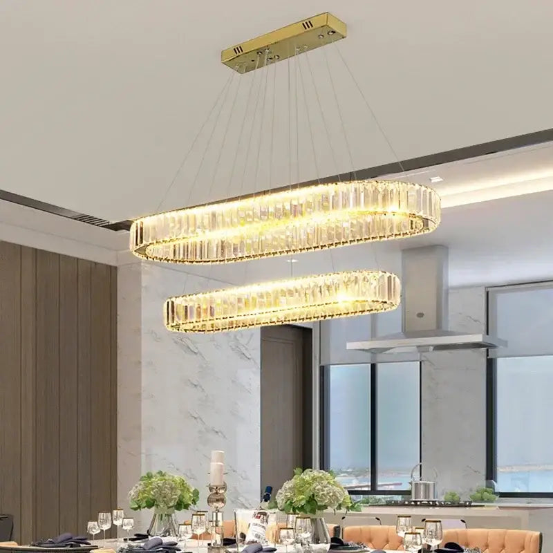Modern gold double ring decorbites crystal led chandelier with illuminated crystal-encrusted oval rings for dining room