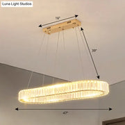 Gold-toned led suspension lamp with optical k9 crystal double-ring chandelier emitting warm light for restaurants and islands