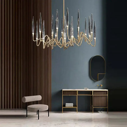A modern decorbites elegant candle shape ceiling chandelier with gold metal frame and clear glass prisms for living room decor