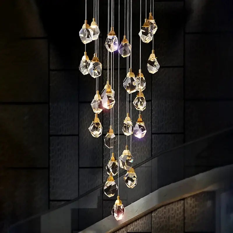 Modern gold elegant crystal chandelier with faceted clear glass droplets by decorbites elegant for living room decor