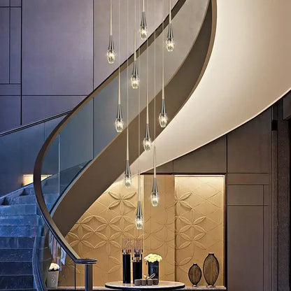 Modern gold elegant crystal chandelier with silver-toned teardrop pendant lights by decorbites elegant crystal decor