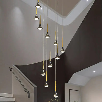 Modern gold elegant horn-shaped chandelier with black trumpet fixtures hanging staggered for staircase decorbites elegant