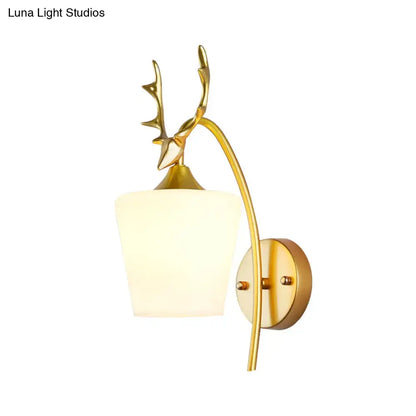 Modern gold elk led incandescent wall sconce with gold-toned deer antler design and frosted glass shade for bedroom lighting