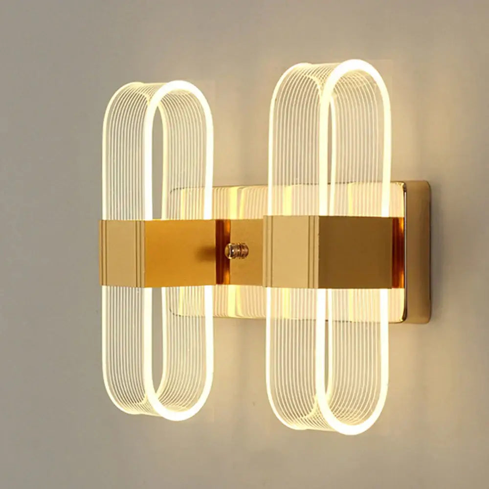 Modern gold elliptical led wall lamp with two curved acrylic light fixtures for bedroom decorbites elliptical led wall lighting