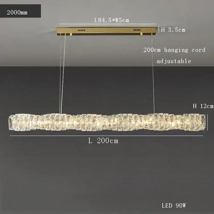 Modern gold elongated glass chandelier led ceiling light with crystal segments emitting warm light for dining room