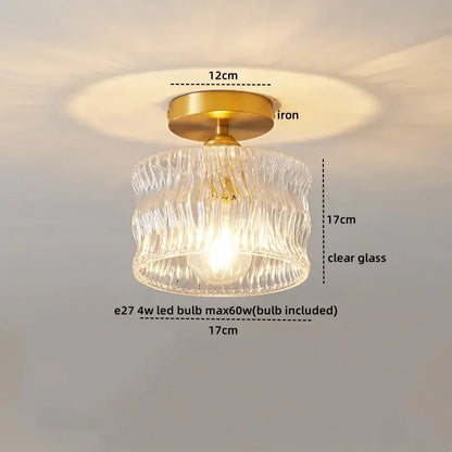 A clear ribbed glass pendant ceiling lamp with brass iron base and e27 led bulb modern gold etched glass design