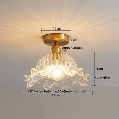 A delicate clear glass modern gold etched led ceiling lamp with fluted petal design and brass iron mounting hardware