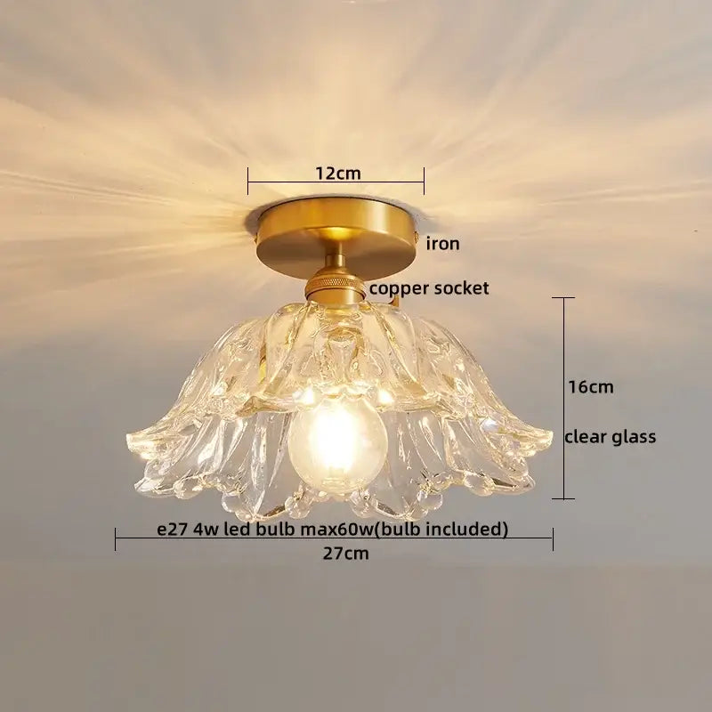 A delicate clear glass chandelier with brass iron base and copper socket for modern led ceiling lamps