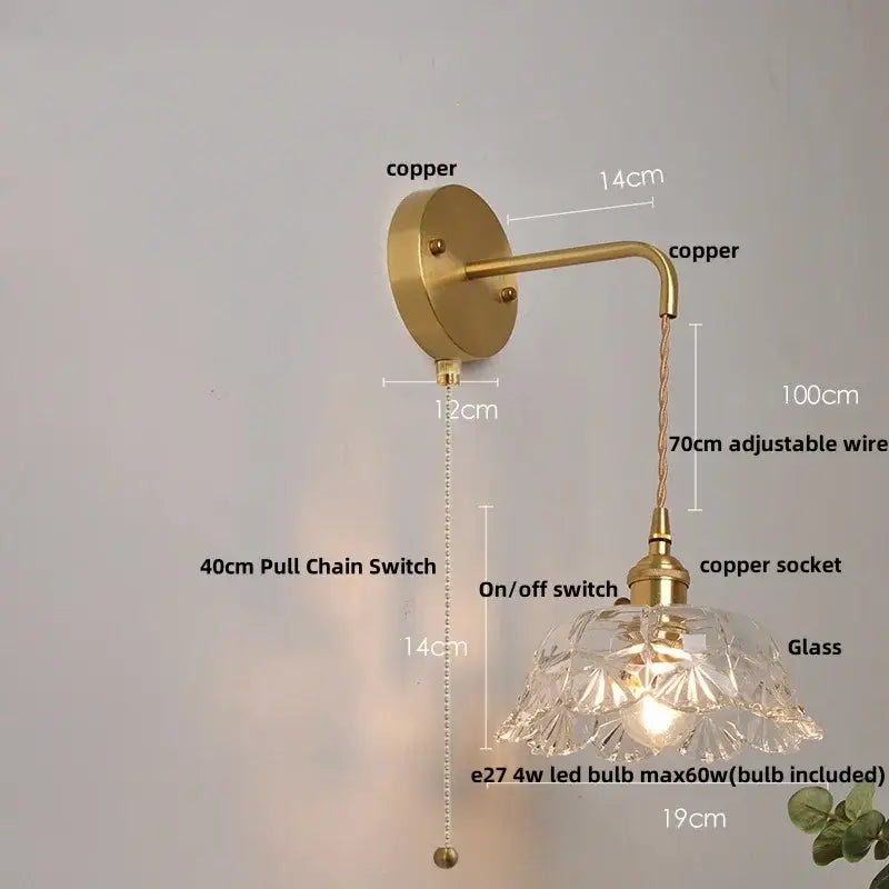 Copper-finished wall light with clear glass faceted shade and adjustable wire arm for modern bedroom decorbites clear glass