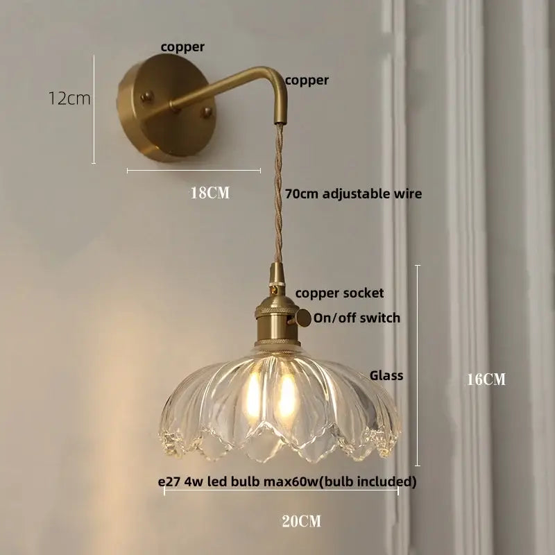 Vintage-style copper wall light with clear petal-shaped glass shade by decorbites clear glass for bedroom decor
