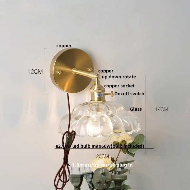 Modern gold faceted wall light with a vintage copper adjustable arm and decorbites clear glass scalloped shade