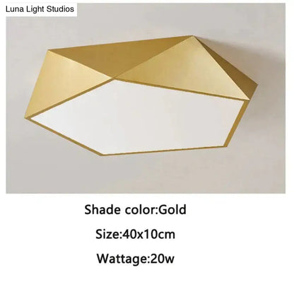 Gold geometric ceiling light with modern faceted design and white diffuser for living room and bedroom lighting