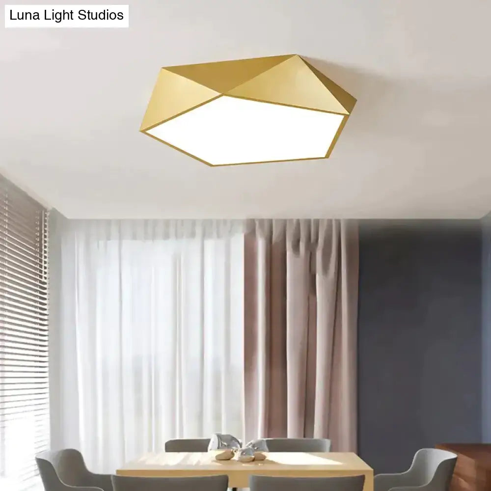 Gold geometric ceiling light with modern faceted design and sleek metallic finish for living room bedroom lighting