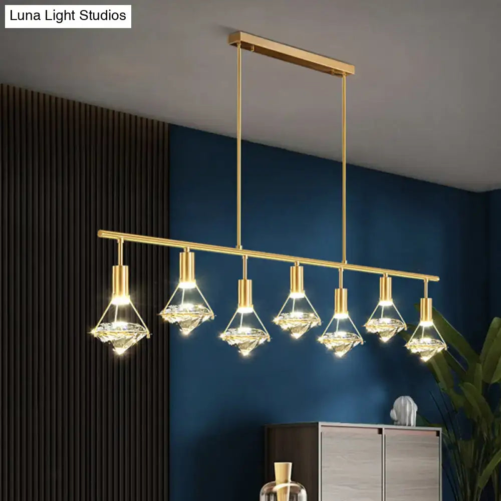 Modern gold finish light fixture with six crystal pendant lights for kitchen island lighting solution