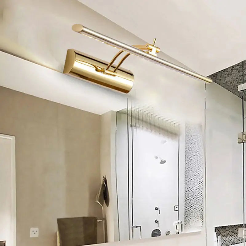 Modern gold finish metal led bathroom wall sconce with a sleek elongated bar and adjustable arm for mirror lighting