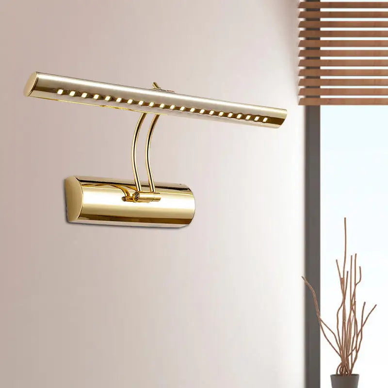 Modern gold finish metal led wall sconce with sleek elongated bar design and adjustable arm for bathroom picture lighting