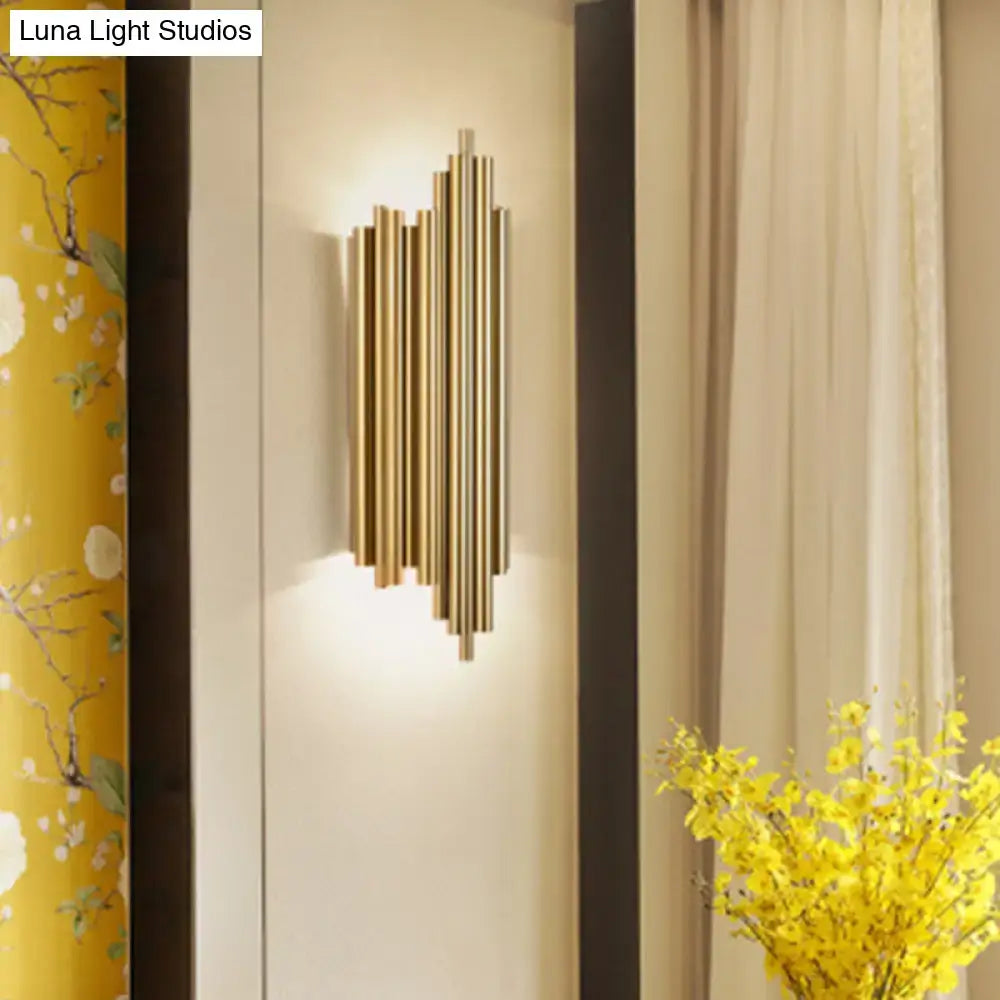 Modern gold finish slim tube wall lamp with vertical cylindrical tubes in a heart-shaped pattern for living room use
