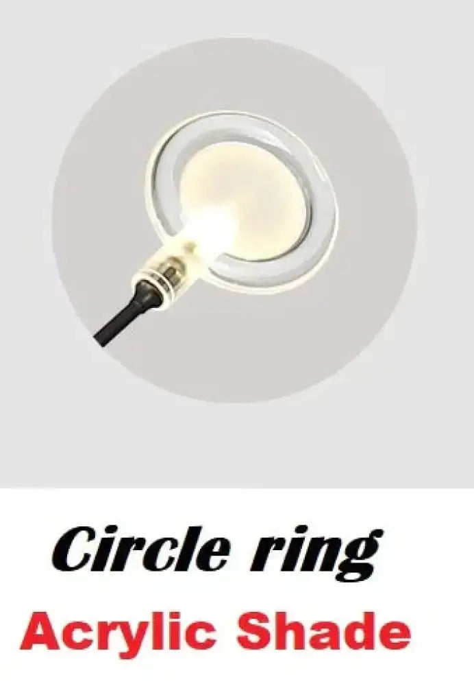 Modern gold firefly tree branch led wall light featuring clear acrylic circle ring with frosted inner shade and black cord