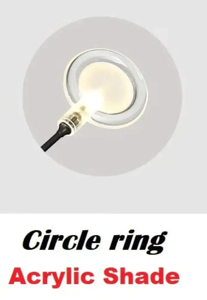 Modern gold firefly tree branch led wall light featuring clear acrylic circle ring with frosted inner shade and black cord