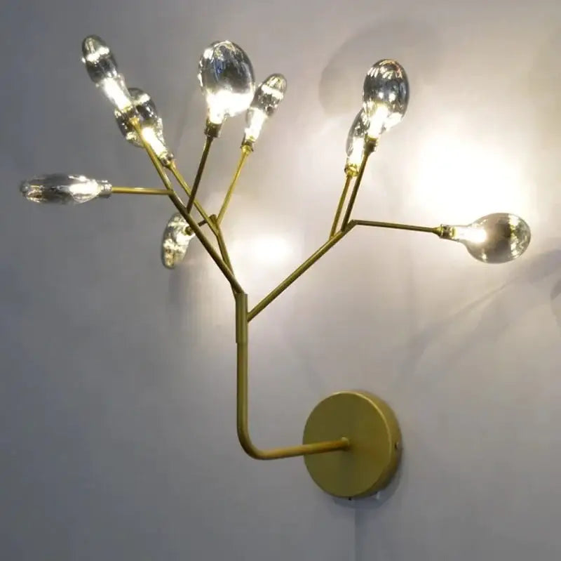 Modern gold firefly tree branch led wall light with multiple clear teardrop glass bulbs for bedroom lighting