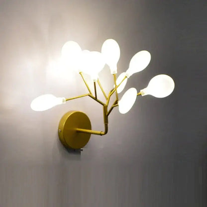 Modern gold firefly tree branch led wall light with a gold-toned metal frame and frosted glass shades for bedroom use