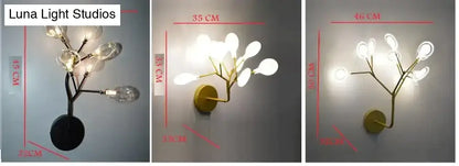 Modern gold firefly tree branch led wall light featuring gold-toned branching arms and clear glass bulb shades