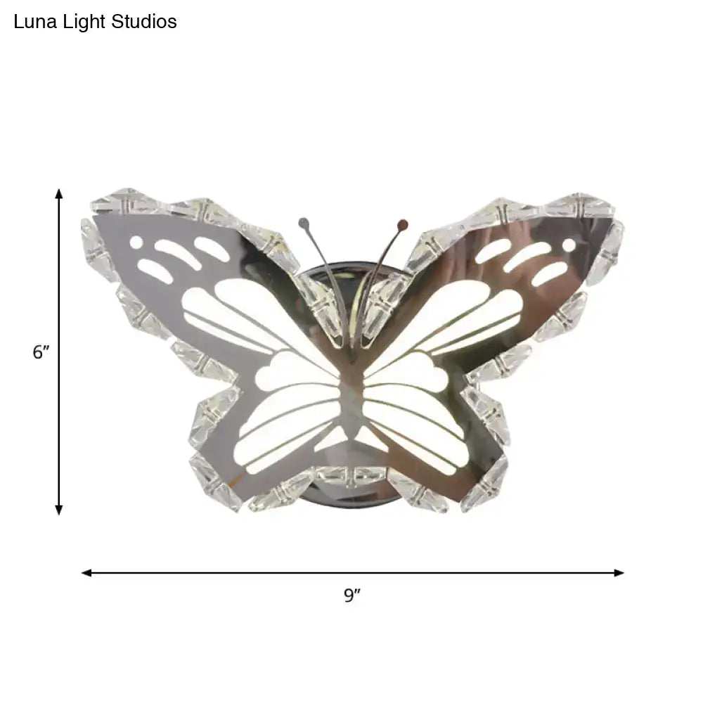 Modern gold fish wall sconce with chrome finished stainless steel butterfly design and crystal shade for warm white bedroom light