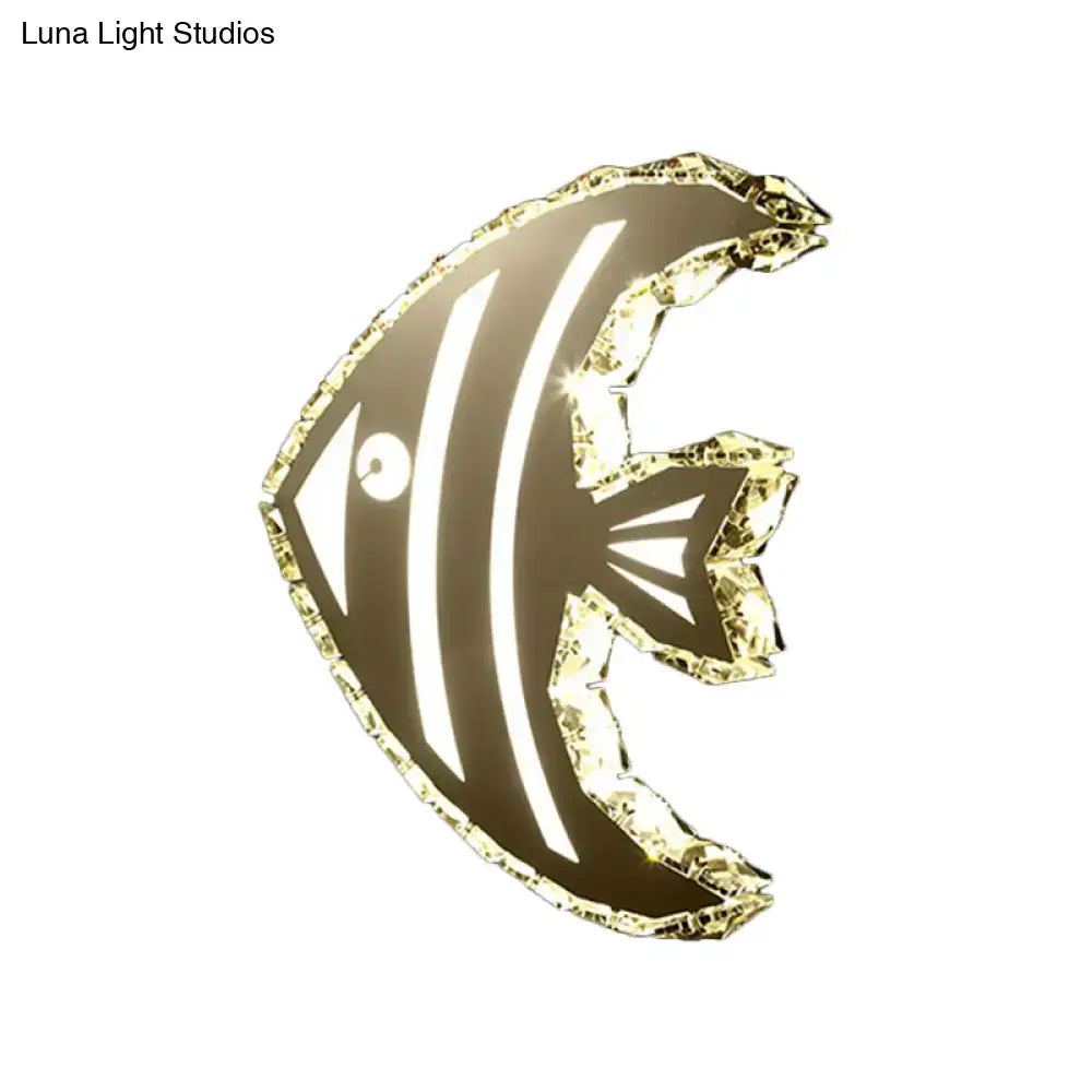 Modern gold fish wall sconce with stainless steel finish crystal shade and warm white light for bedroom use