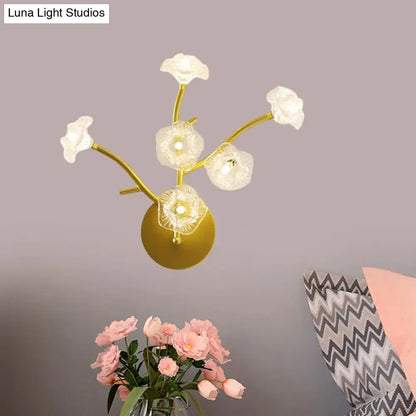 Modern gold floral bedside wall mount lamp with five translucent flower-shaped glass shades light fixture
