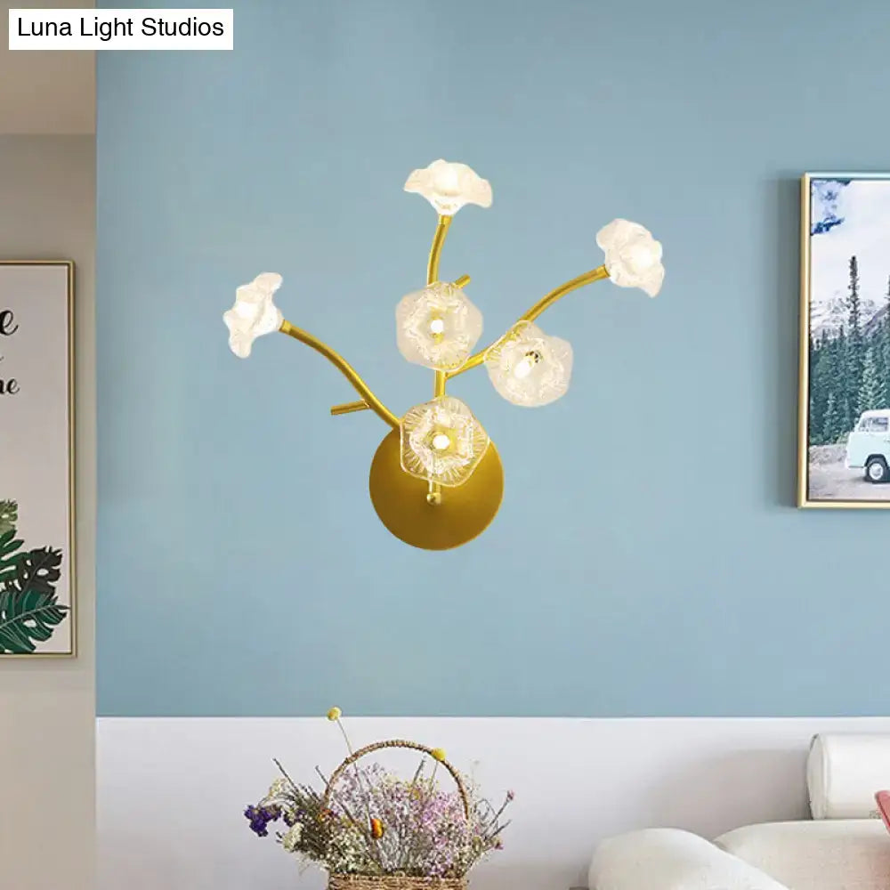 Modern gold floral bedside wall mount lamp with five translucent flower-shaped glass shades light fixture