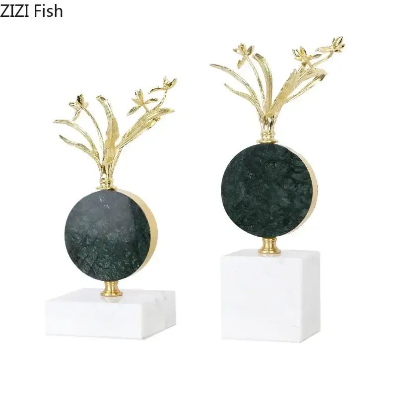 Elegant dark green marble orbs with gold flower crystal sculpture on white marble base for modern desk decoration