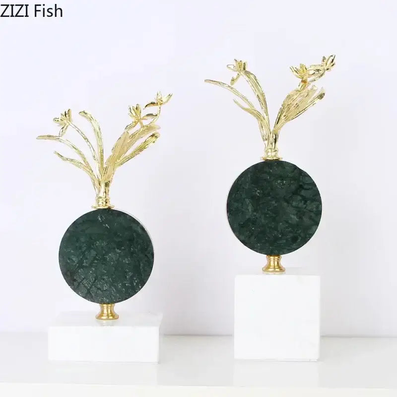 Modern gold flower crystal sculpture desk decoration featuring metallic floral design on dark green bases with marble pedestals