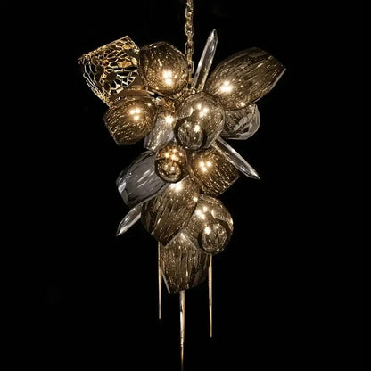 Modern gold flower glass shades led chandelier with textured glass orbs and crystal shards hanging by a delicate chain